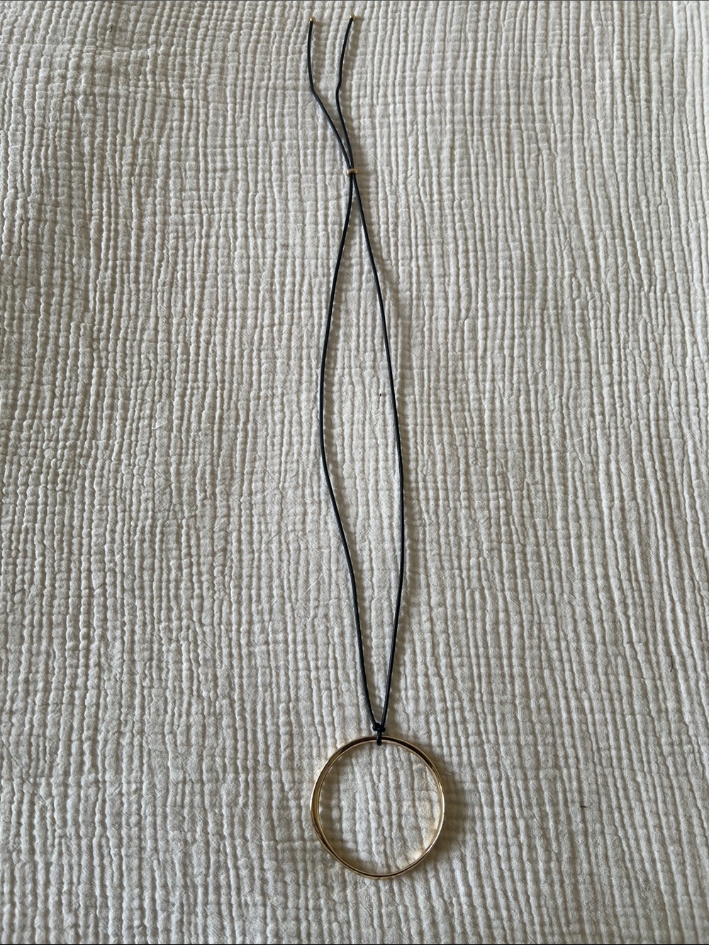 Mango Gold Circle Pendant on Black Cord